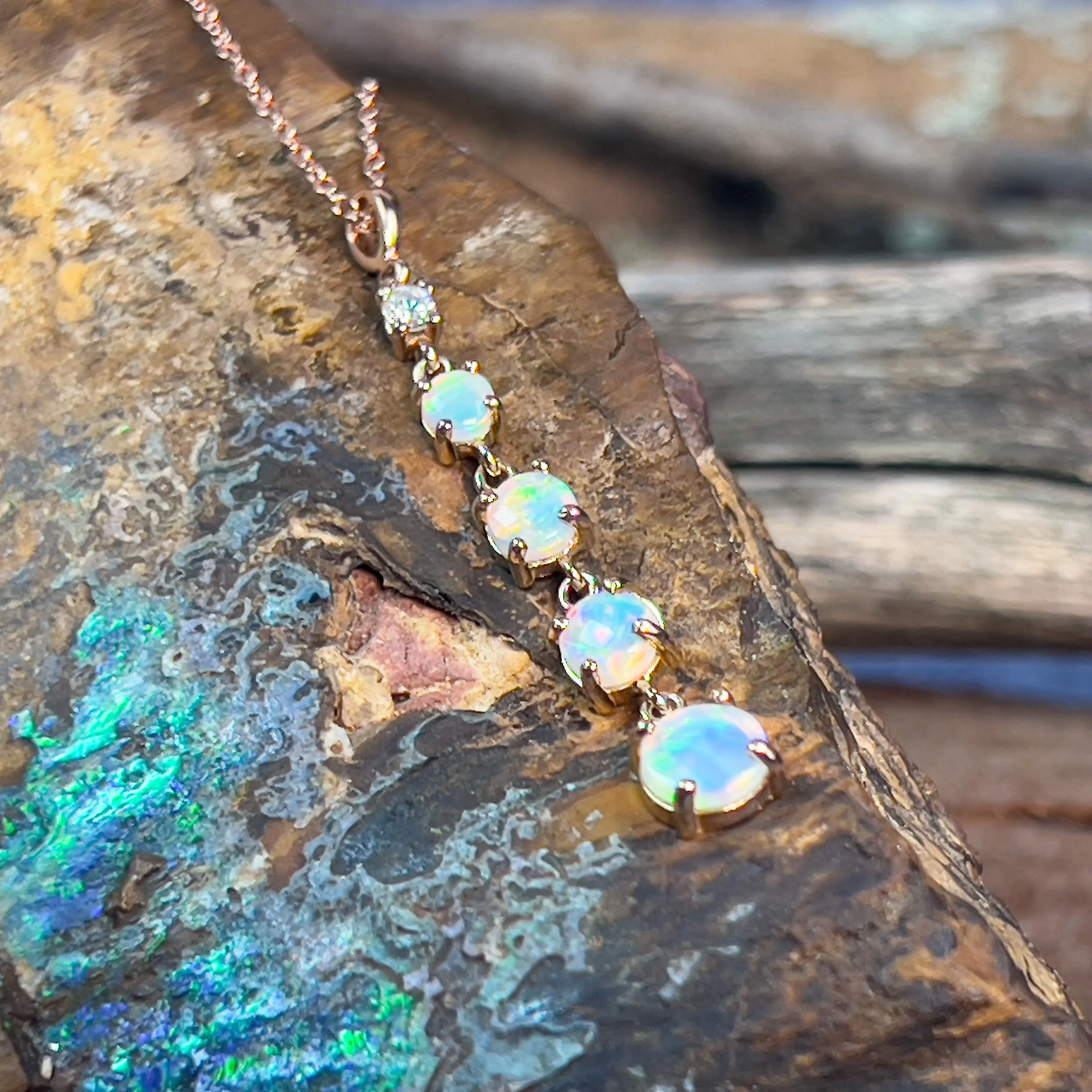 14kt Rose Gold Fire Opal and diamond dangling pendant