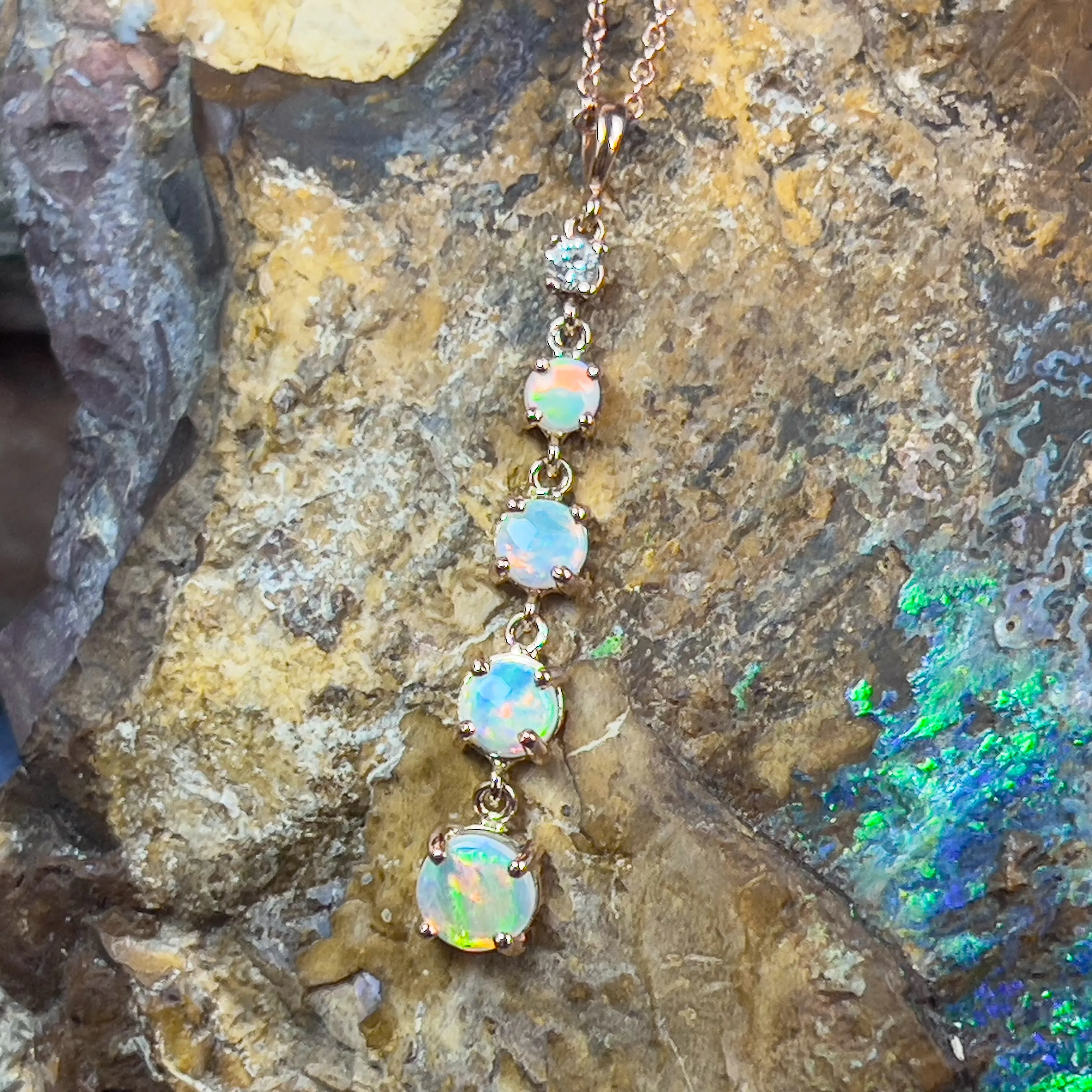 14kt Rose Gold Fire Opal and diamond dangling pendant