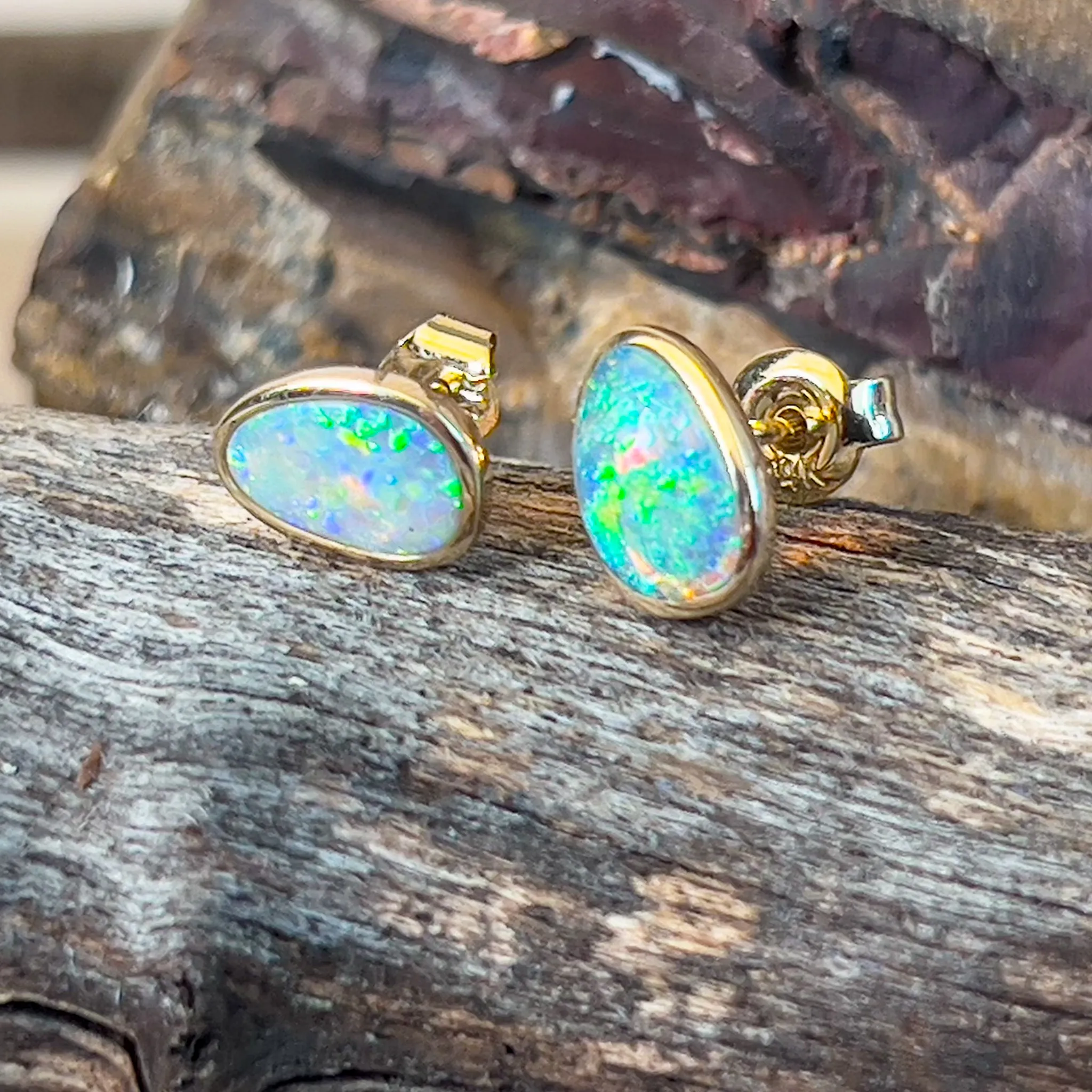 14kt Yellow Gold Black Opal 0.75ct bezel studs