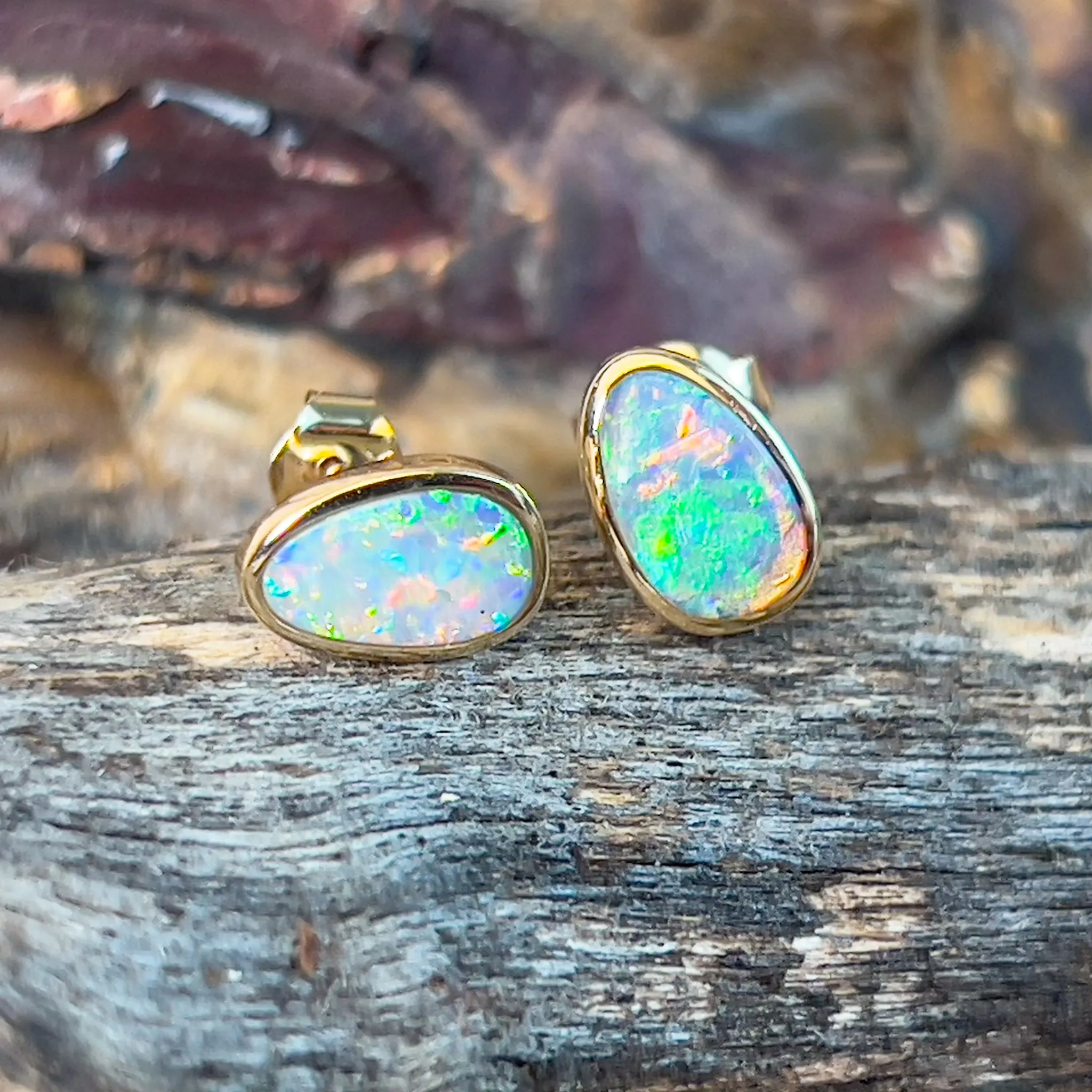 14kt Yellow Gold Black Opal 0.75ct bezel studs