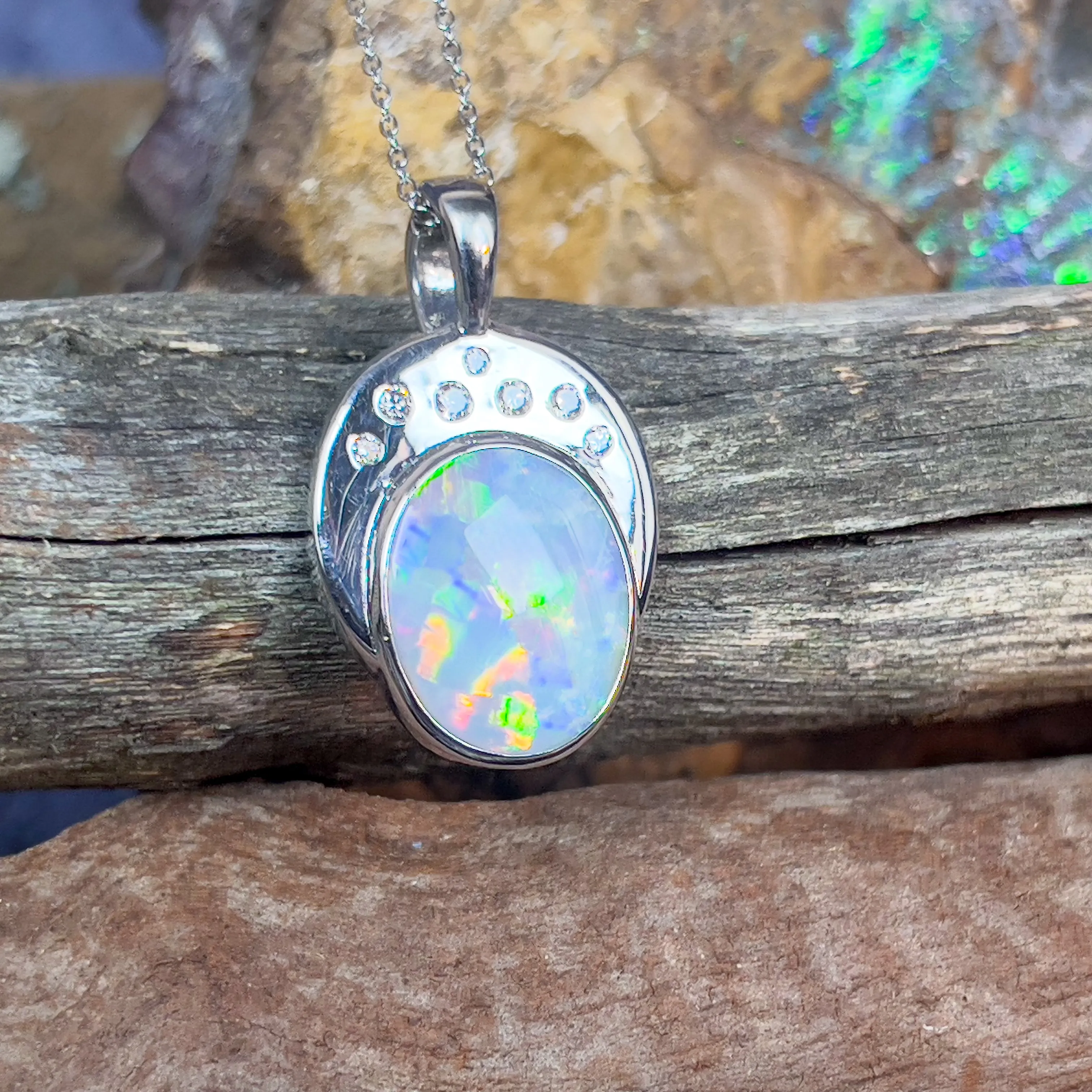 18kt Black Opal Oval 5.8ct and 7 Diamonds pendant enhancer