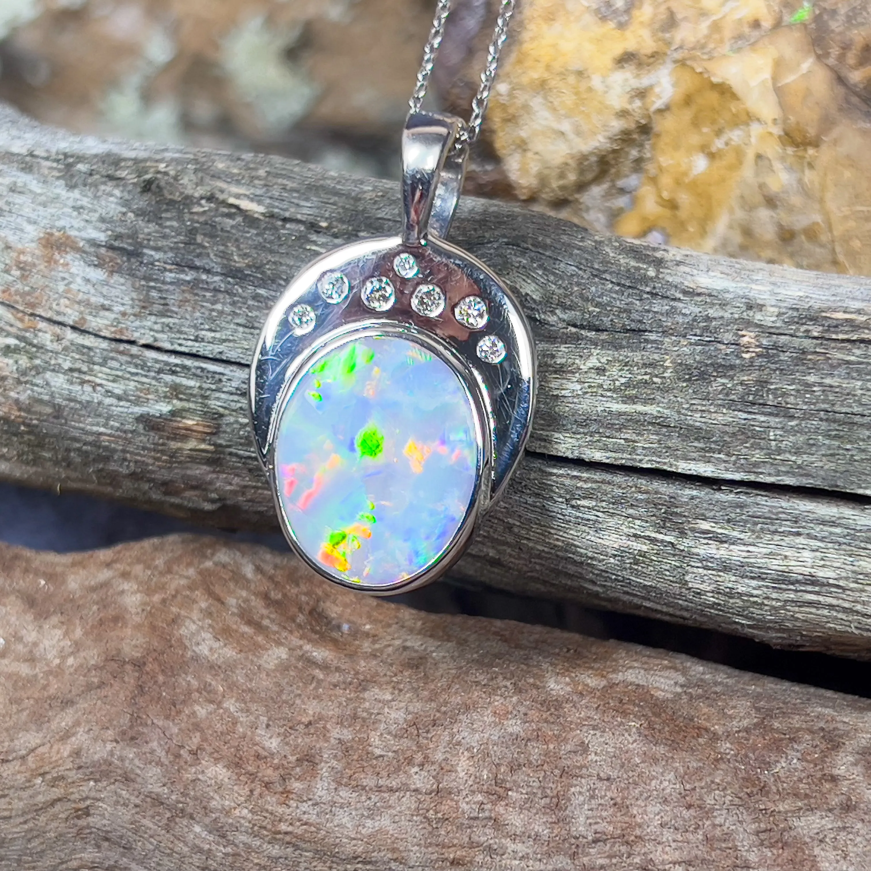 18kt Black Opal Oval 5.8ct and 7 Diamonds pendant enhancer